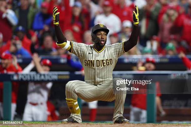 Jurickson Profar of the San Diego Padres reacts after being called for a strike on an attempted checked swing during the ninth inning against the...