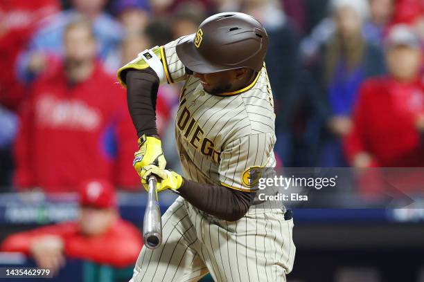 Jurickson Profar of the San Diego Padres is called for a strike on an attempted checked swing during the ninth inning against the Philadelphia...