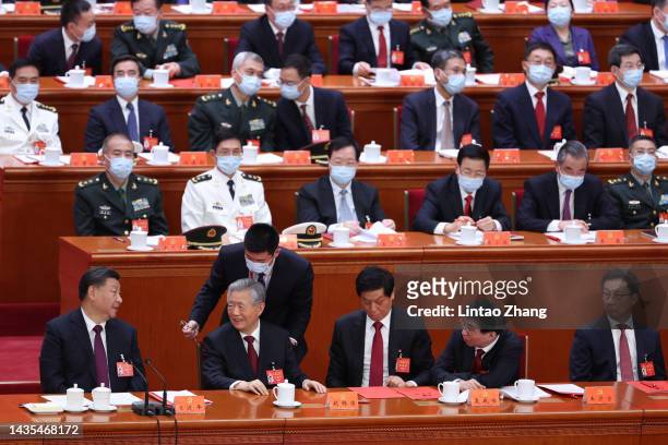 Chinese President Xi Jinping, former President Hu Jintao, members of the Standing Committee of the Politburo of the Communist Party of China Li...