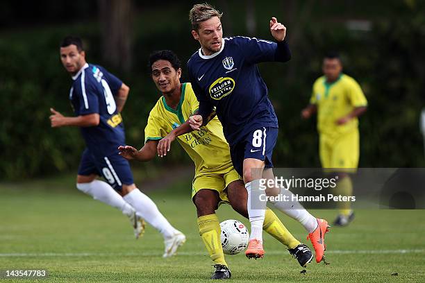 David Mulligan of Auckland competes with Stanley Atani of Tefana during the OFC Champions League Final 1 match between Auckland City FC and AS Tefana...