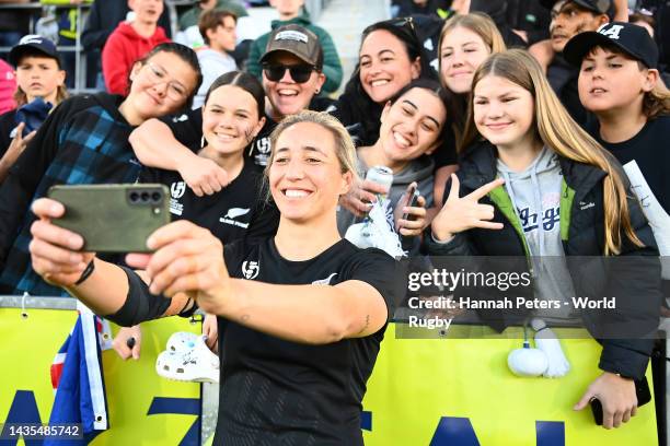 Sarah Hirini of New Zealand takes a photo with fans during the Pool A Rugby World Cup 2021 match between New Zealand and Scotland at Northland Events...