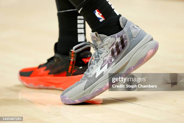 The Adidas shoes of Damian Lillard of the Portland Trail Blazers are seen during the game against the Phoenix Suns at Moda Center on October 21, 2022...