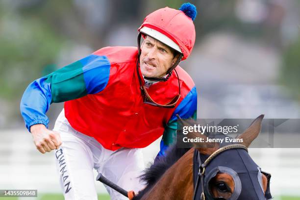 Hugh Bowman celebrates after winning race 8 the Moet & Chandon Spring Champion Stakes on Sharp 'N' Smart during Spring Champions Stakes Day at Royal...