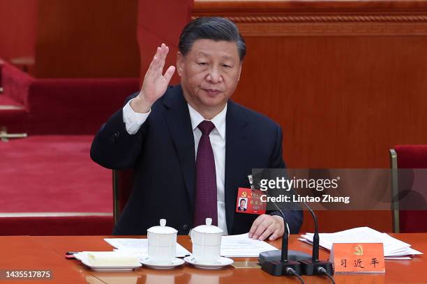 Chinese President Xi Jinping votes at the closing ceremony of the 20th National Congress of the Communist Party of China at the Great Hall of the...