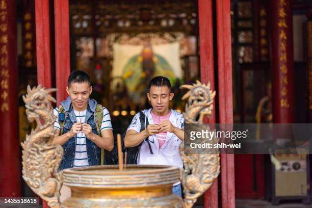 asian chinese gay couples travel locally in taiwan - lgbt history stock pictures, royalty-free photos & images