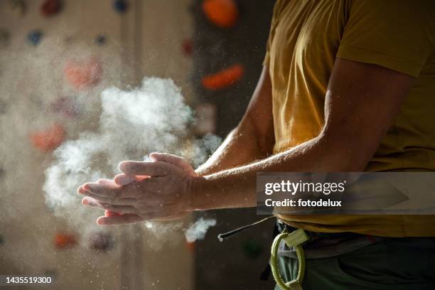 climber man getting ready for training - hands clapping close up stock pictures, royalty-free photos & images