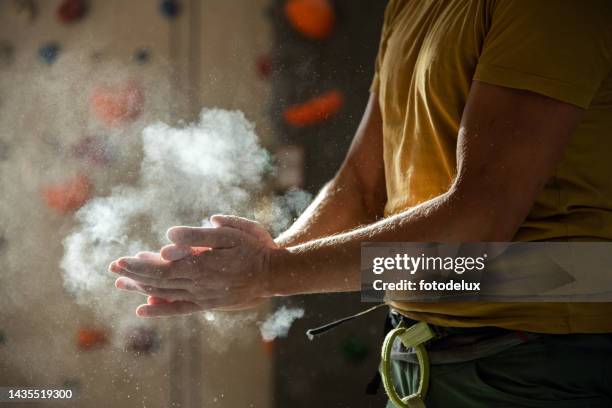 climber man getting ready for training - chalk wall stock pictures, royalty-free photos & images