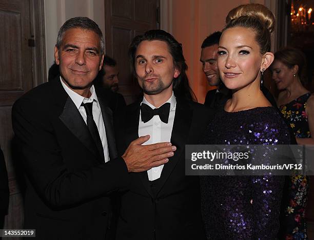 George Clooney, Matthew Bellamy and Kate Hudson attend the Bloomberg & Vanity Fair cocktail reception following the 2012 White House Correspondents'...