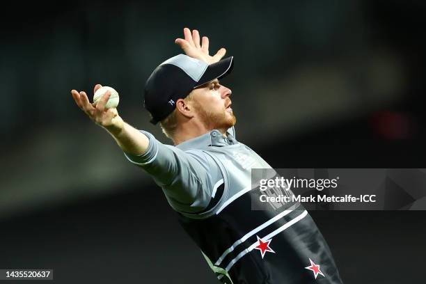 Glenn Phillips of New Zealand celebrates catching out Marcus Stoinis of Australia during the ICC Men's T20 World Cup match between Australia and New...