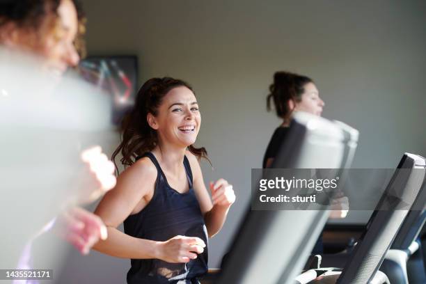 cardiovascular fun - running indoors stock pictures, royalty-free photos & images