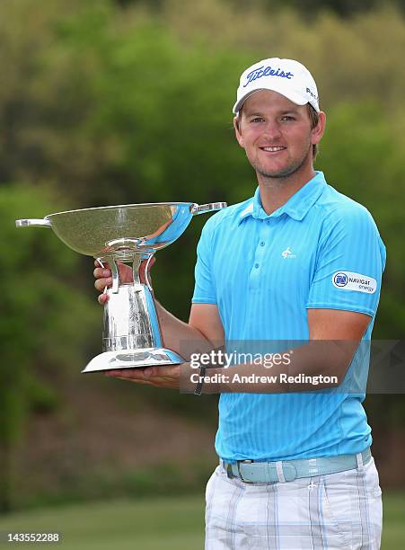 Bernd Wiesberger of Austria poses with the trophy after winning the Ballantine's Championship at Blackstone Golf Club on April 29, 2012 in Icheon,...