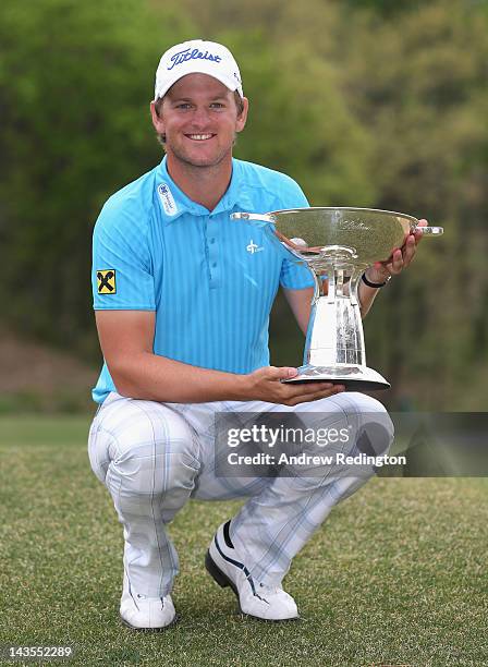 Bernd Wiesberger of Austria poses with the trophy after winning the Ballantine's Championship at Blackstone Golf Club on April 29, 2012 in Icheon,...