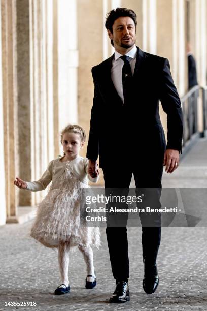 Andrea Giambruno, partner of newly appointed Italy's Prime Minister Giorgia Meloni and their daughter Ginevra arrive at the Quirinale Palace to...
