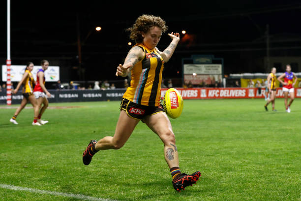 Tilly Lucas-Rodd of Hawthorn kicks the ball during the round nine AFLW match between the Hawthorn Hawks and the Brisbane Lions at SkyBus Stadium on...