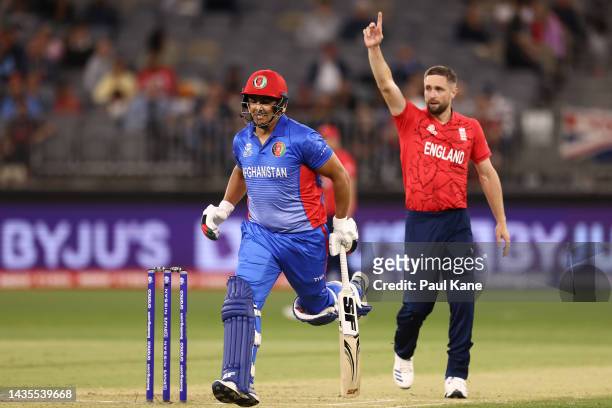 Hazratullah Zazai of Afghanistan makes his ground after taking a single during the ICC Men's T20 World Cup match between England and Afghanistan at...