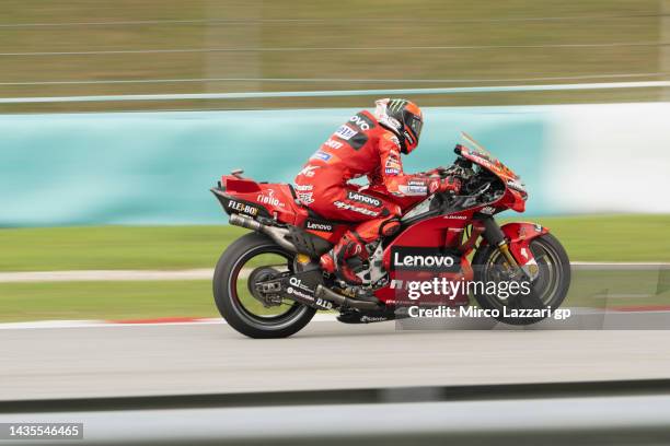 Francesco Bagnaia of Italy and Ducati Lenovo Team lifts the front wheel during the MotoGP of Malaysia - Qualifying at Sepang Circuit on October 22,...