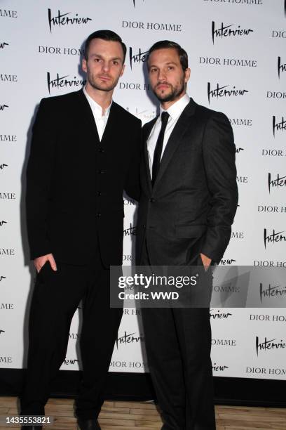 Kris Van Assche and Sebastian Stan attend Dior Homme\'s pop-up shop opening party. Both wear Dior Homme.