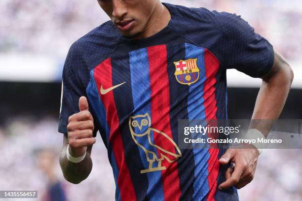 Detail of Raphael Dias Belloli alias Raphinha of FC Barcelona t-shirt with the modified OVO owl logo on the front of the FC Barcelona shirt, which...