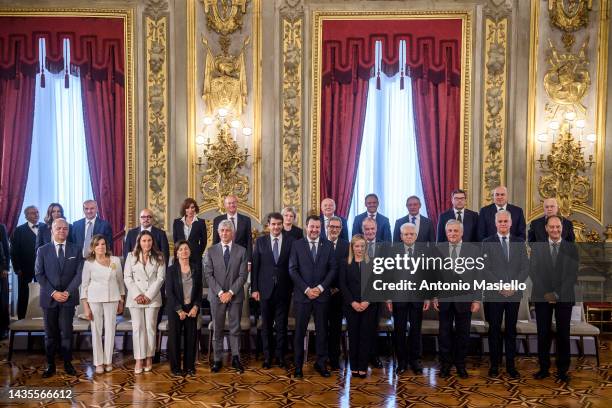 Italian President Sergio Mattarella and Italian Prime Minister Giorgia Meloni pose for a group photo with the 24 members of Italy's new government,...