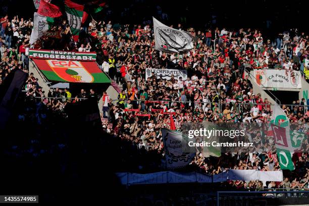 Augsburg fans show their support prior to the Bundesliga match between FC Augsburg and RB Leipzig at WWK-Arena on October 22, 2022 in Augsburg,...