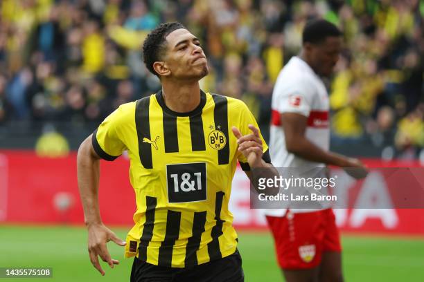 Jude Bellingham of Borussia Dortmund celebrates after scoring their team's first goal during the Bundesliga match between Borussia Dortmund and VfB...