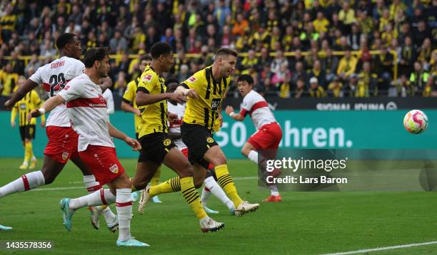 Niklas Sule of Borussia Dortmund scores their team's second goal during the Bundesliga match between Borussia Dortmund and VfB Stuttgart at Signal...