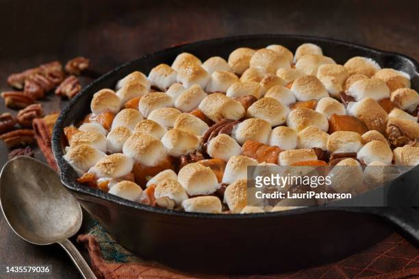 sweet potato casserole with marshmallows - baked sweet potato stock pictures, royalty-free photos & images