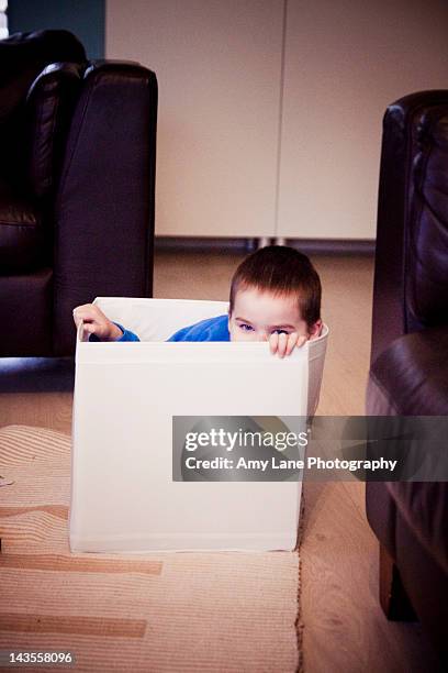 Hiding In Box Child Hiding In Box Photos and Premium High Res Pictures - Getty Images