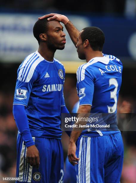 Daniel Sturridge of Chelsea is congratulated by Ashley Cole as he scores their first goal during the Barclays Premier League match between Chelsea...