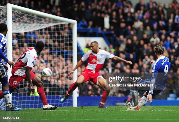 Fernando Torres of Chelsea scores their fourth goal during the Barclays Premier League match between Chelsea and Queens Park Rangers at Stamford...