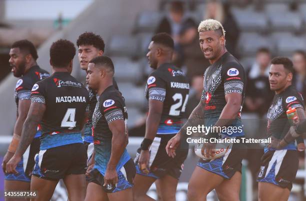 Viliame Kikau of Fiji celebrates after scoring their team's fourth try during the Rugby League World Cup 2021 Pool B match between Fiji and Italy at...