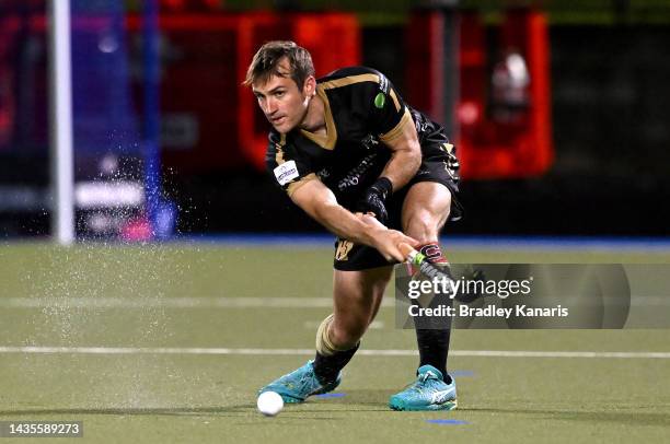 Josh Simmonds of Melbourne strikes the ball during the round four Hockey One League Men's match between Brisbane Blaze and Hockey Club Melbourne at...