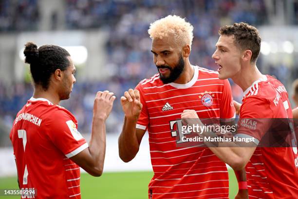 Eric Maxim Choupo-Moting of Bayern Munich celebrates with teammates after scoring their team's second goal during the Bundesliga match between TSG...