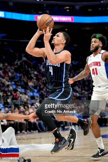 Jalen Suggs of the Orlando Magic shoots the ball against the Detroit Pistons at Little Caesars Arena on October 19, 2022 in Detroit, Michigan. NOTE...