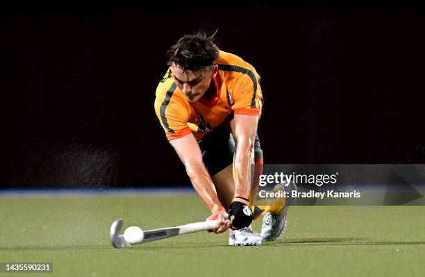 Tim Howard of the Blaze strikes the ball during the round four Hockey One League Men's match between Brisbane Blaze and Hockey Club Melbourne at...