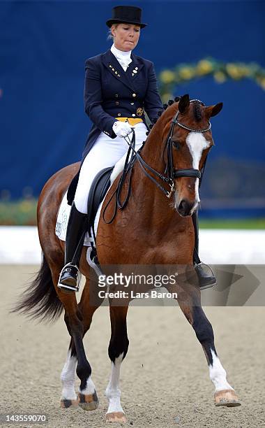 Anne van Olst of Denmark and Exquis Clearwater complete their Dressage Test at Horses & Dreams on April 29, 2012 in Hagen, Germany.