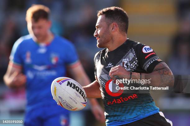 Apisai Koroisau of Fiji celebrates after scoring their team's fifth try during the Rugby League World Cup 2021 Pool B match between Fiji and Italy at...