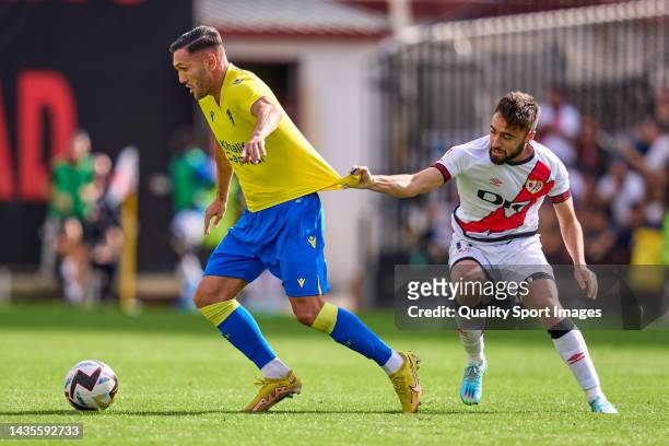 Unai Lopez of Rayo Vallecano battle for the ball with Lucas Perez of Cadiz CF during the LaLiga Santander match between Rayo Vallecano and Cadiz CF...