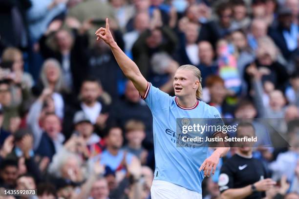 Erling Haaland of Manchester City celebrates after scoring their team's first goal during the Premier League match between Manchester City and...
