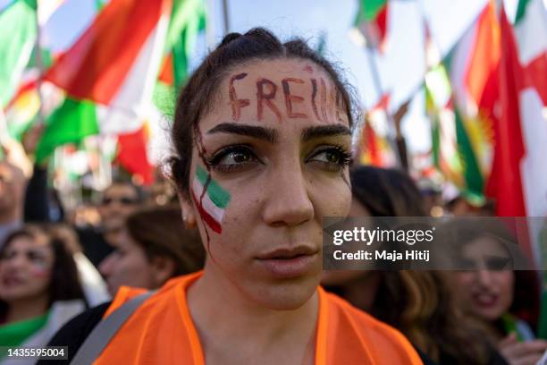 Protestors attend a rally organised by the "Women Life Freedom Collective" in solidarity with women and protesters in Iran on October 22, 2022 in...
