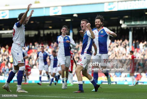 Adam Wharton of Blackburn Rovers celebrates with teammates after scoring their side's second goal during the Sky Bet Championship between Blackburn...