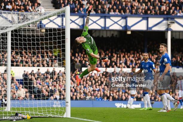 Jordan Pickford of Everton makes a save during the Premier League match between Everton FC and Crystal Palace at Goodison Park on October 22, 2022 in...