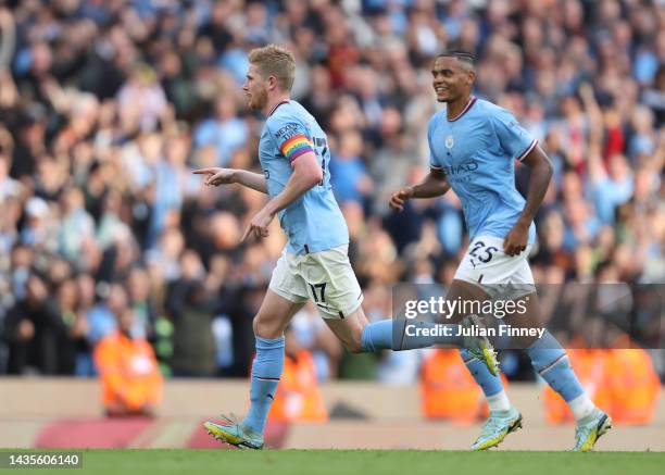 Kevin De Bruyne of Manchester City celebrates after scoring their team's third goal during the Premier League match between Manchester City and...