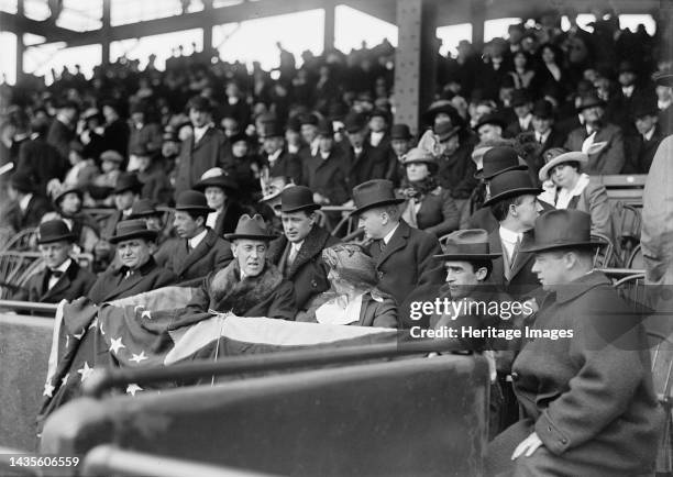 Baseball - Professional, Wilson At Game, 1913. US president in fur-collared coat, with wife Ellen Axson Wilson. Cary Travers Grayson, Chairman of the...