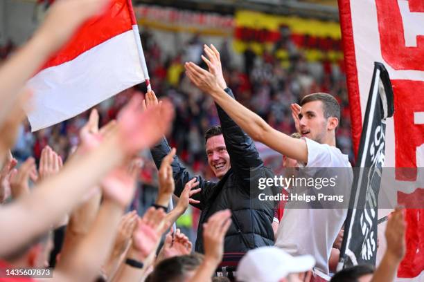 Michael Gregoritsch of SC Freiburg celebrates with fans following the Bundesliga match between Sport-Club Freiburg and SV Werder Bremen at...