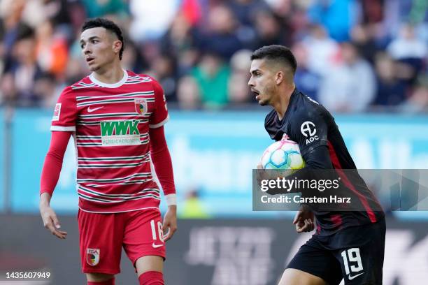 Andre Silva of RB Leipzig celebrates after scoring their team's first goal during the Bundesliga match between FC Augsburg and RB Leipzig at...