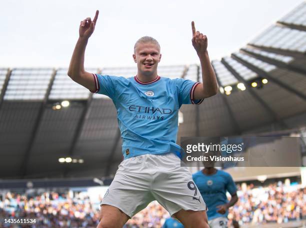 Erling Haaland of Manchester City celebrates scoring his second goal during the Premier League match between Manchester City and Brighton & Hove...