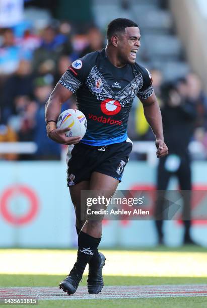 Penioni Tagituimua of Fiji celebrates after scoring their team's sixth try during the Rugby League World Cup 2021 Pool B match between Fiji and Italy...