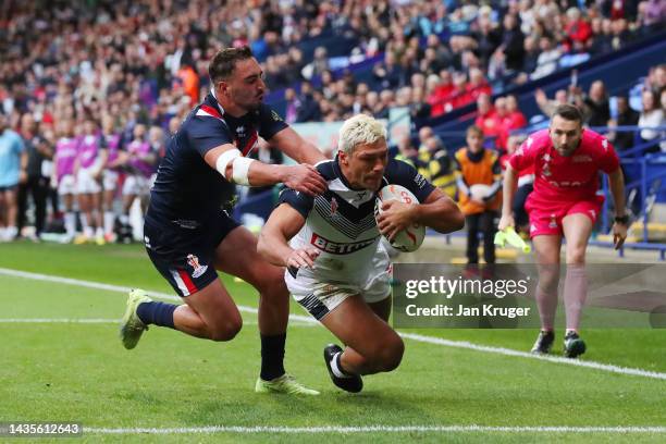 Ryan Hall of England touches down for their team's second try during the Rugby League World Cup 2021 Pool A match between England and France at...