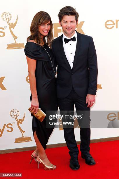 Naomi Sablan and Adam Scott attend the 63rd annual Primetime Emmy Awards at the Nokia Theatre.